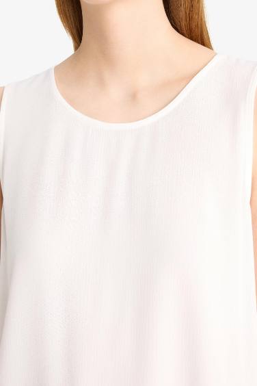 بلوزة بدون كم قصة عادية برقبة مستديرة من Fall in Love