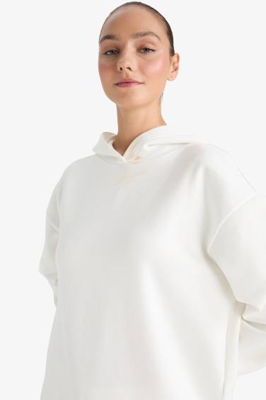 سويت شيرت بيزك سادة قصة مريحة بكابيشون