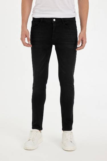 Pantalon Jean extra slim à taille normale et jambes extra étroites