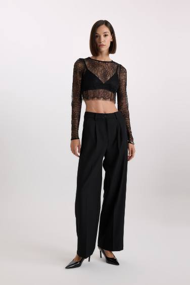 Chemisier à manches longues en dentelle à col rond