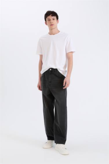 بنطلون جينز باجي فيت برجل واسع وايد ليج