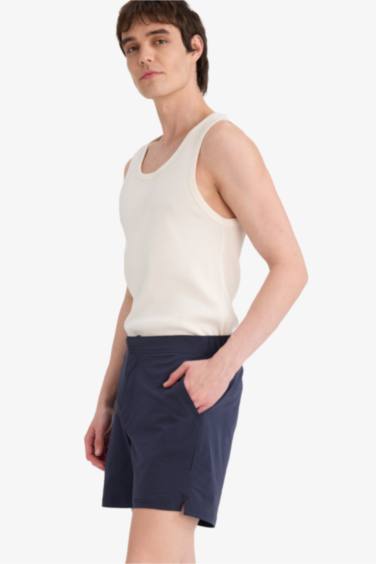 شورت بحر قصير ببطانة شبكية بازرار