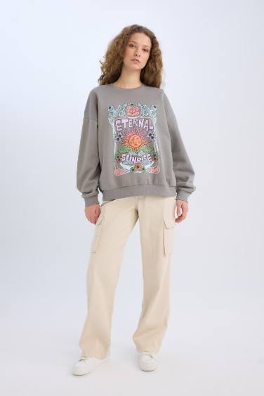 سويت شيرت قصة فضفاضة برقبة مستديرة