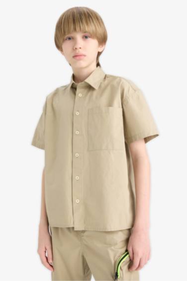 قميص بولو اولادي باراشوت نص كم اوفر سايز