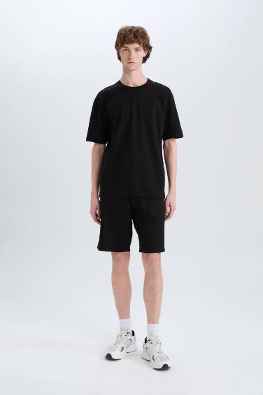 شورت برمودا من قطن قصة عادية