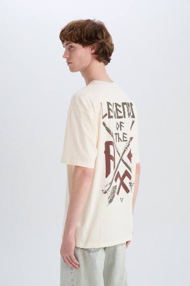 تيشيرت قطن أوفر سايز بطبعة من الخلف برقبة مستديرة