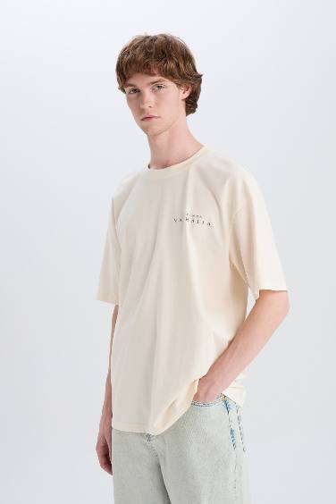 تيشيرت قطن أوفر سايز بطبعة من الخلف برقبة مستديرة