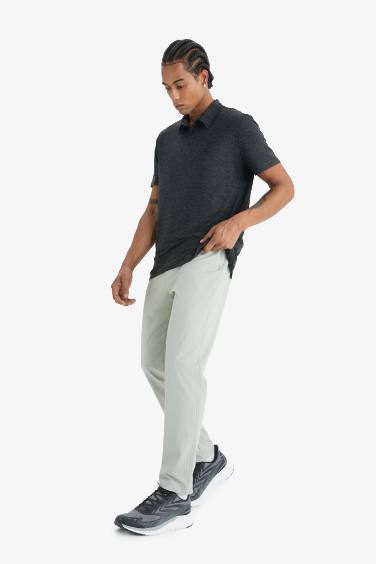 DeFactoFit Slim Fit Dar Kesim Standart Paça Esnek Multifonksiyonel Dokuma Sporcu Pantolon