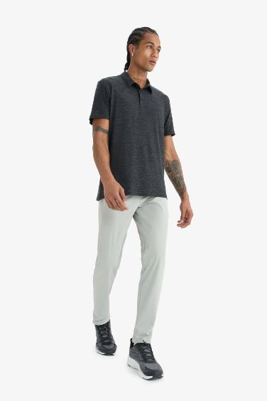 DeFactoFit Slim Fit Dar Kesim Standart Paça Esnek Multifonksiyonel Dokuma Sporcu Pantolon