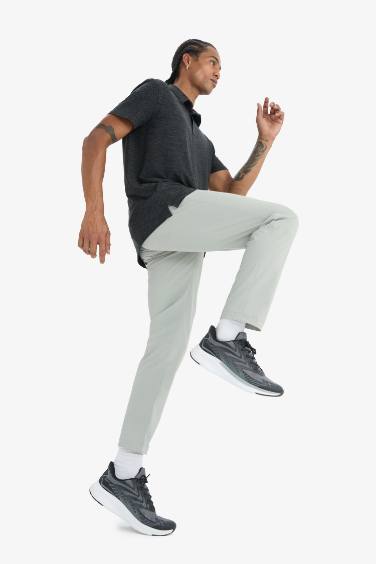 DeFactoFit Slim Fit Dar Kesim Standart Paça Esnek Multifonksiyonel Dokuma Sporcu Pantolon