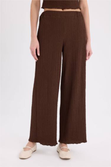 Широкие брюки из жатой ткани