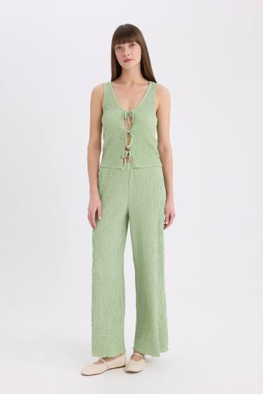 Pantalon large en tissu gaufré