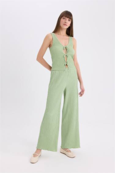 Pantalon large en tissu gaufré