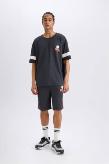 شورت قصة عادية مطبوع بجيب