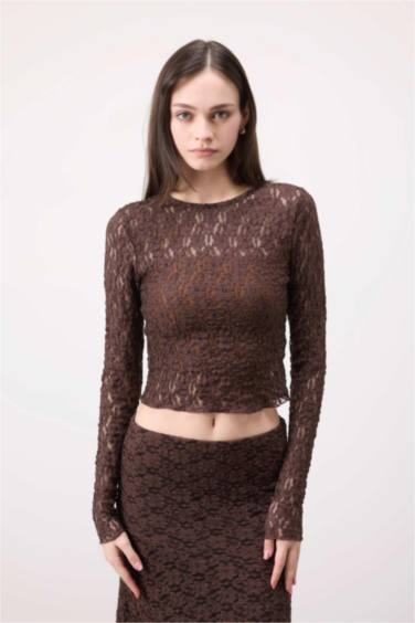 T-shirt slim en dentelle à col rond et manches longues