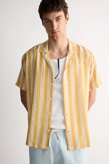 قميص مخطط نص ردن قصة عادية بياخة عالية