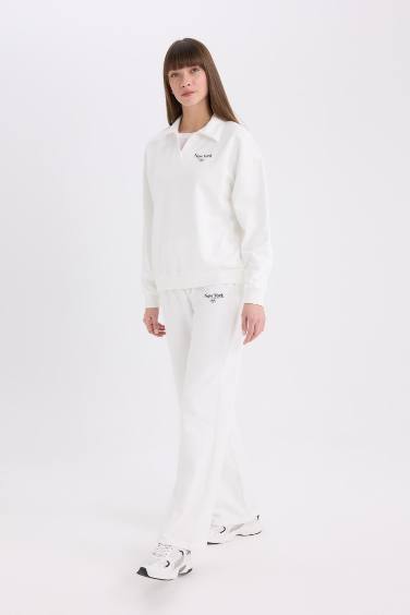 سروال رياضي واسع مطبوع بخصر مطاطي