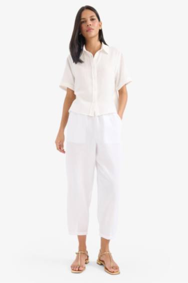 Tapered Fit High Waist Muslin Trousers