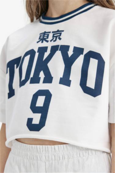 طقم بناتي بطلون بجامة رياضي وتيشيرت - قطعتين