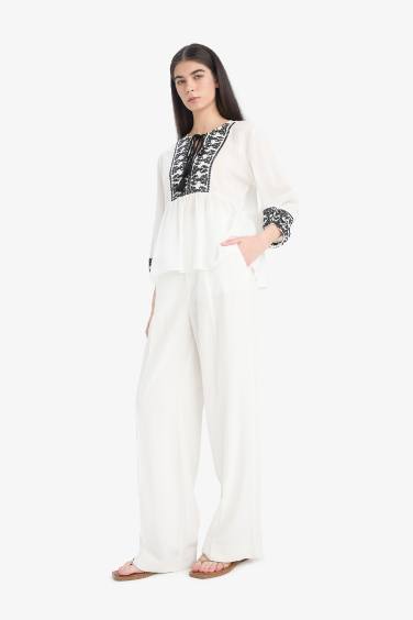 بلوزة كم طويل مطرز ذو مظهر كتان قصة عادية أسود