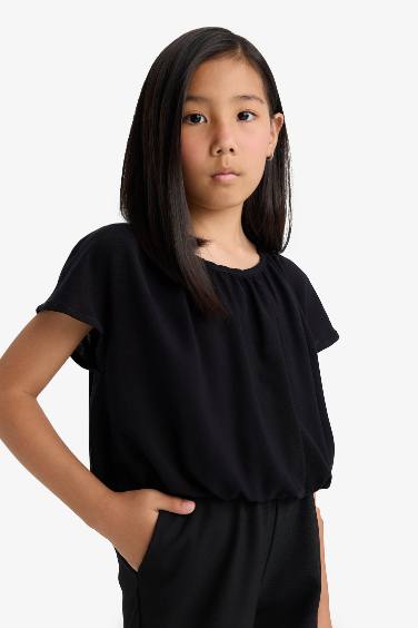 Blouse noire à manches courtes et col rond pour fille