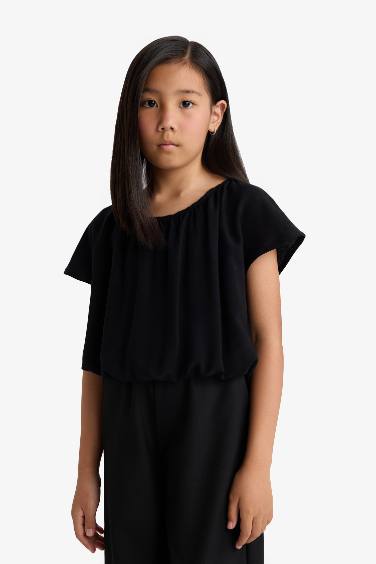 Blouse noire à manches courtes et col rond pour fille