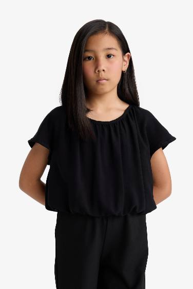 Blouse noire à manches courtes et col rond pour fille