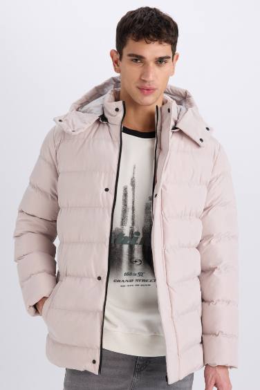 قمصلة نفخ قصة عادية بغطاء للرأس بسحاب وجيب