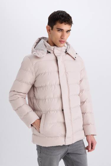 قمصلة نفخ قصة عادية بغطاء للرأس بسحاب وجيب