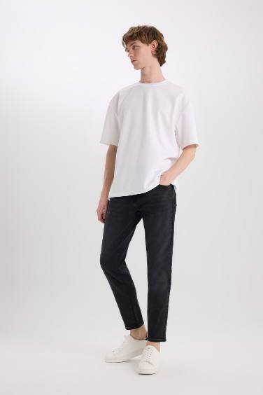 بنطلون جينز سليم فيت برجل ضيق وخصر عادي