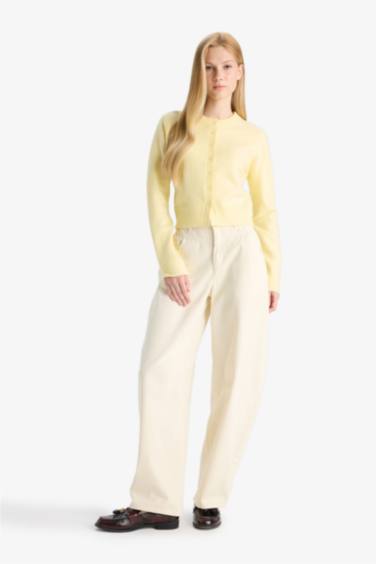 جاكيت تريكو سليم فيت بياخة مستديرة بأزرار