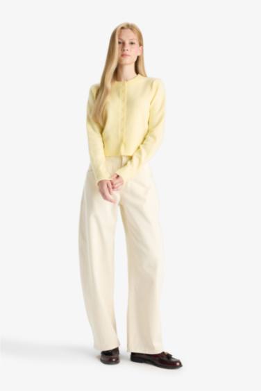 جاكيت تريكو سليم فيت بياخة مستديرة بأزرار