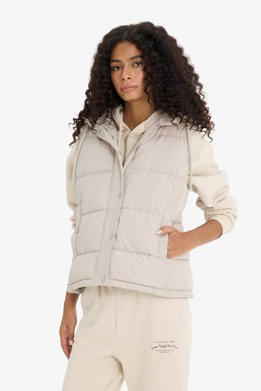 Gilet doudoune à capuche et fermeture zip Coupe régulière