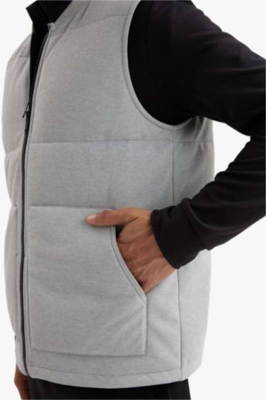 Gilet zippé à col montant et poches Coupe régulière