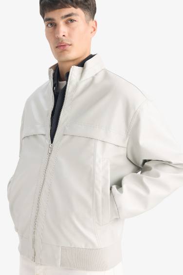 Oversize Fit Stand Collar Zippered Pocket Faux Leather Jacket