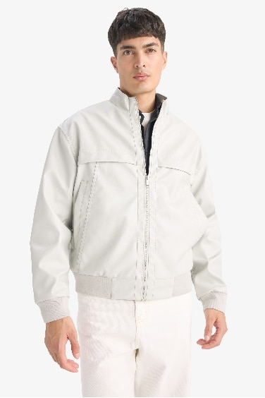 Oversize Fit Stand Collar Zippered Pocket Faux Leather Jacket