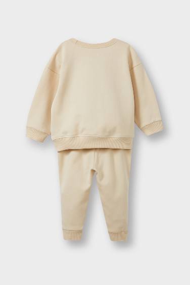 طقم بيبي اولادي سويت شيرت وسويت بانتس بطبعة شعار قماش خفيف - قطعتين