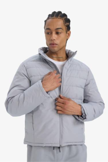 جاكيت وتر بروف شتوي قصة عادية بجيب من DeFactoFit