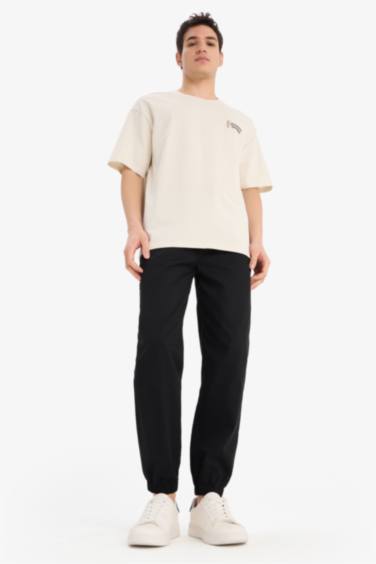 %100 Pamuk Looney Tunes Boxy Fit Rahat Kesim Bisiklet Yaka Sırt Baskılı Kısa Kollu Tişört