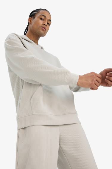 سويت شيرت اوفر سايز بكابيشون بجيب