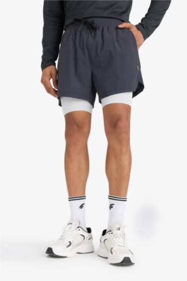 DeFactoFit Slim Fit Dar Kesim Sporcu İçi Taytlı Kısa Paça Şort