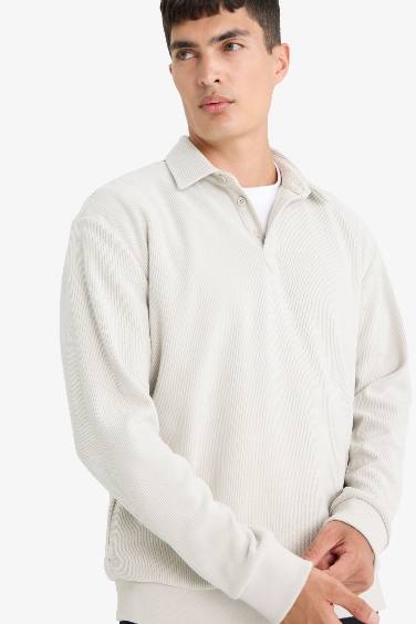 سويت شيرت مخمل قصة عادية بياقة بولو