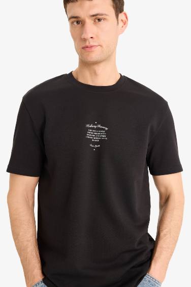 T-shirt imprimé à col rond et manches courtes Coupe régulière