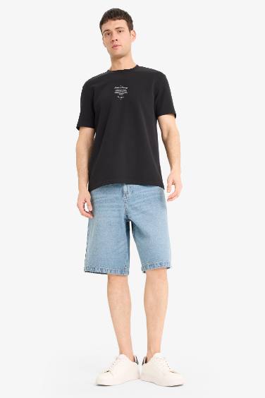 T-shirt imprimé à col rond et manches courtes Coupe régulière