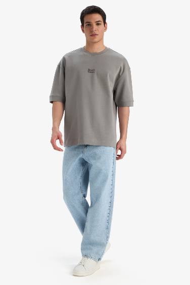 تيشيرت نص كم مطبوع قصة فضفاضة برقبة مستديرة