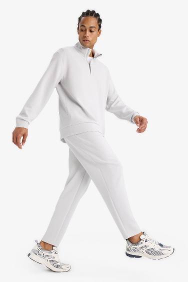 بنطلون بجامة رياضي جوجر قصة عادية من DeFactoFit