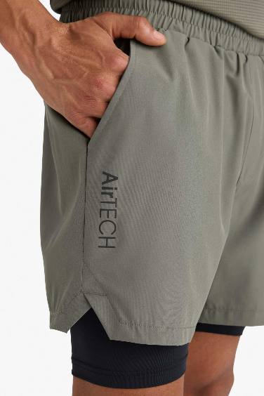 DeFactoFit Slim Fit Dar Kesim Sporcu İçi Taytlı Dokuma Şort