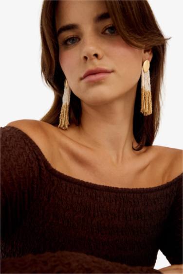 Woman Dangling Straw Detailed Earrings