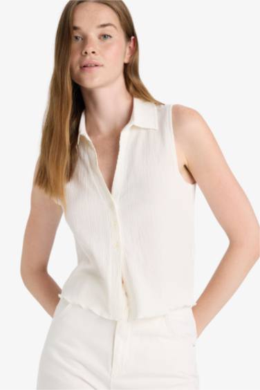 بلوزة كت مخصر بياخة قميص