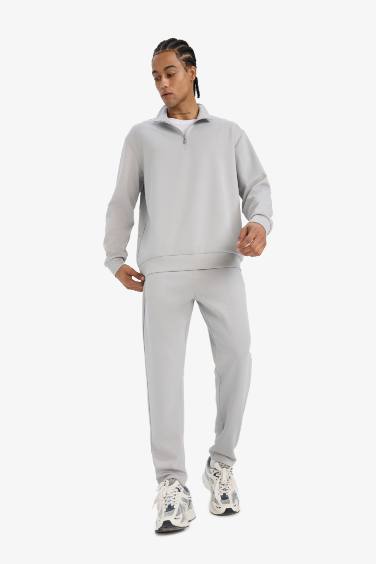 سويت شيرت رياضي قصة عادية بياخة عالية بسحاب من DeFactoFit